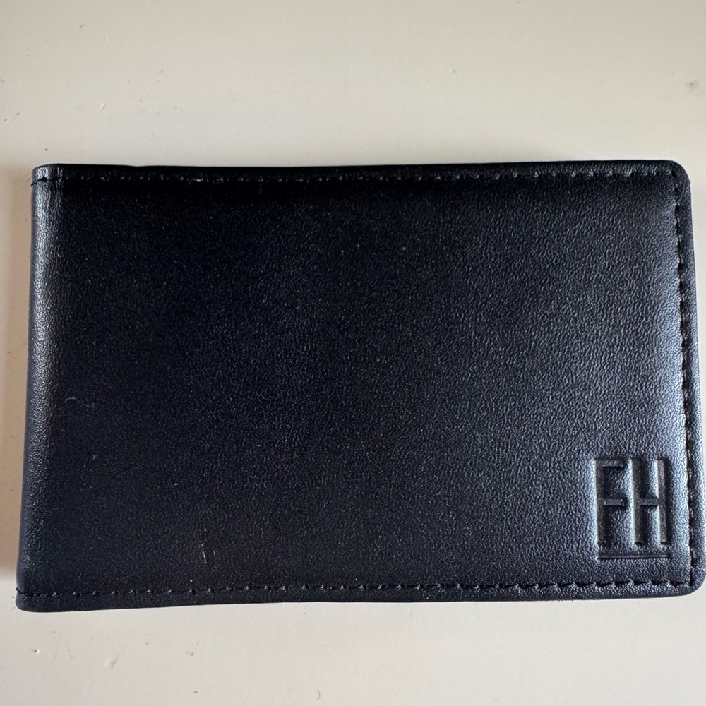 Compact Black Wallet with Leather Finish and Rectangular Design